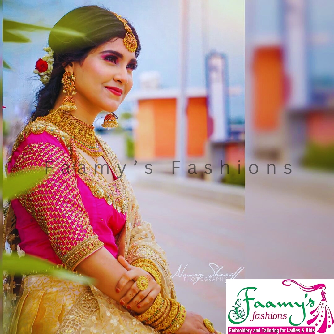 Woman in traditional Indian attire posing for Faamy’s Fashions advertisement.