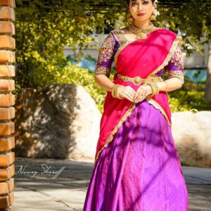 Traditional Indian bridal blouse with intricate embroidery and vibrant saree lehenga